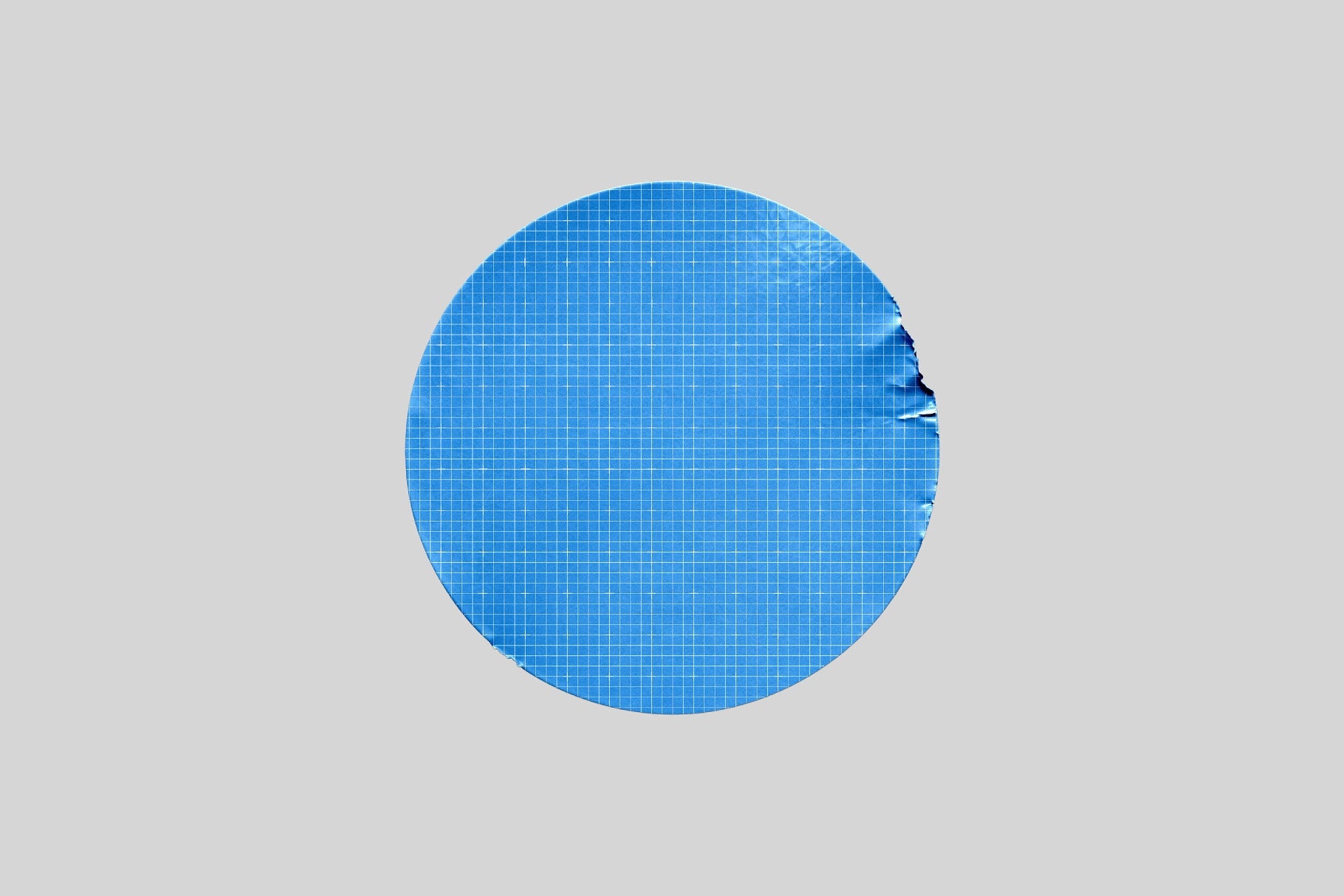 Round Sticker Mockup with Wrinkles & Edge Dent